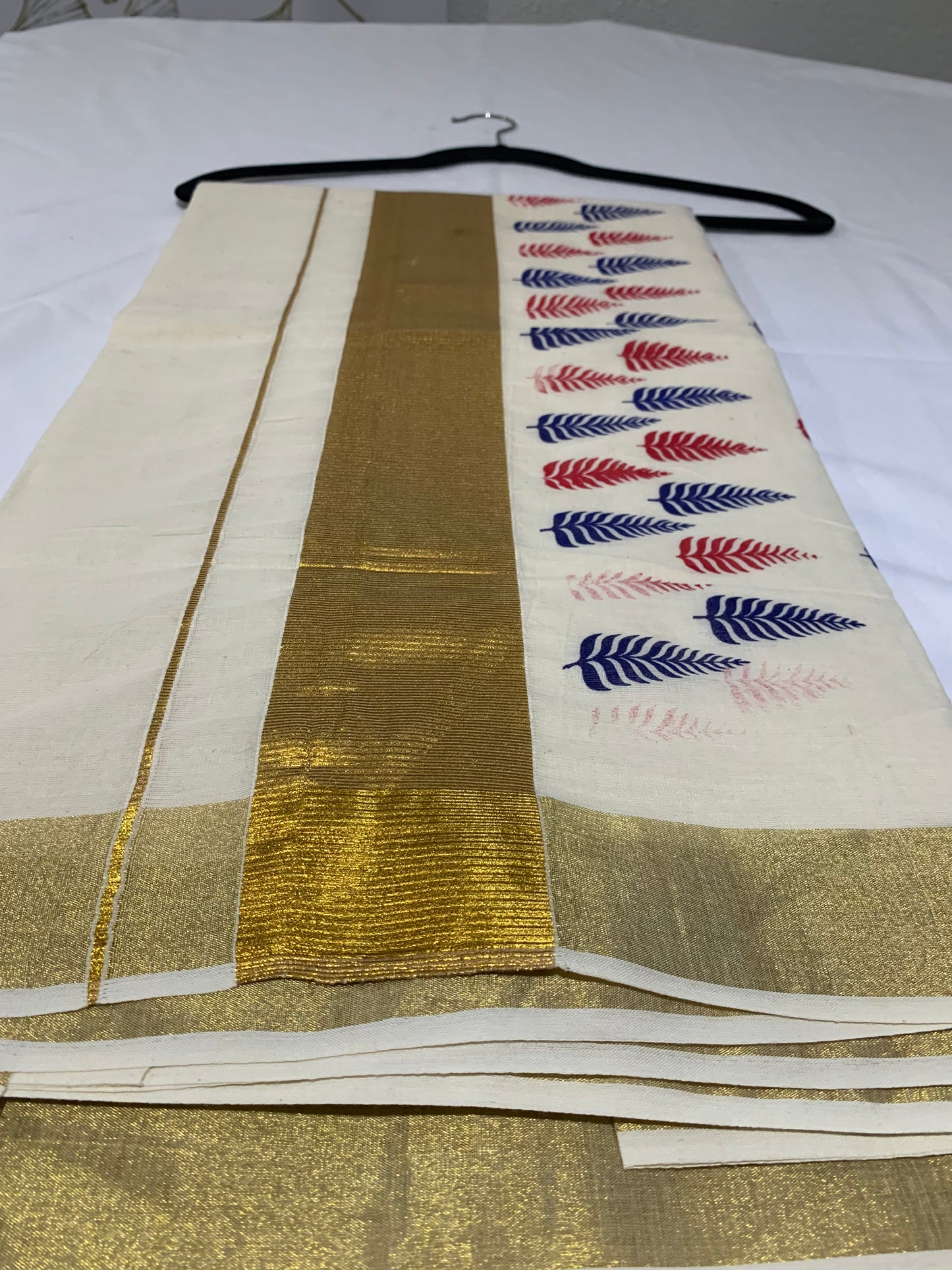Golden printed kasavu saree