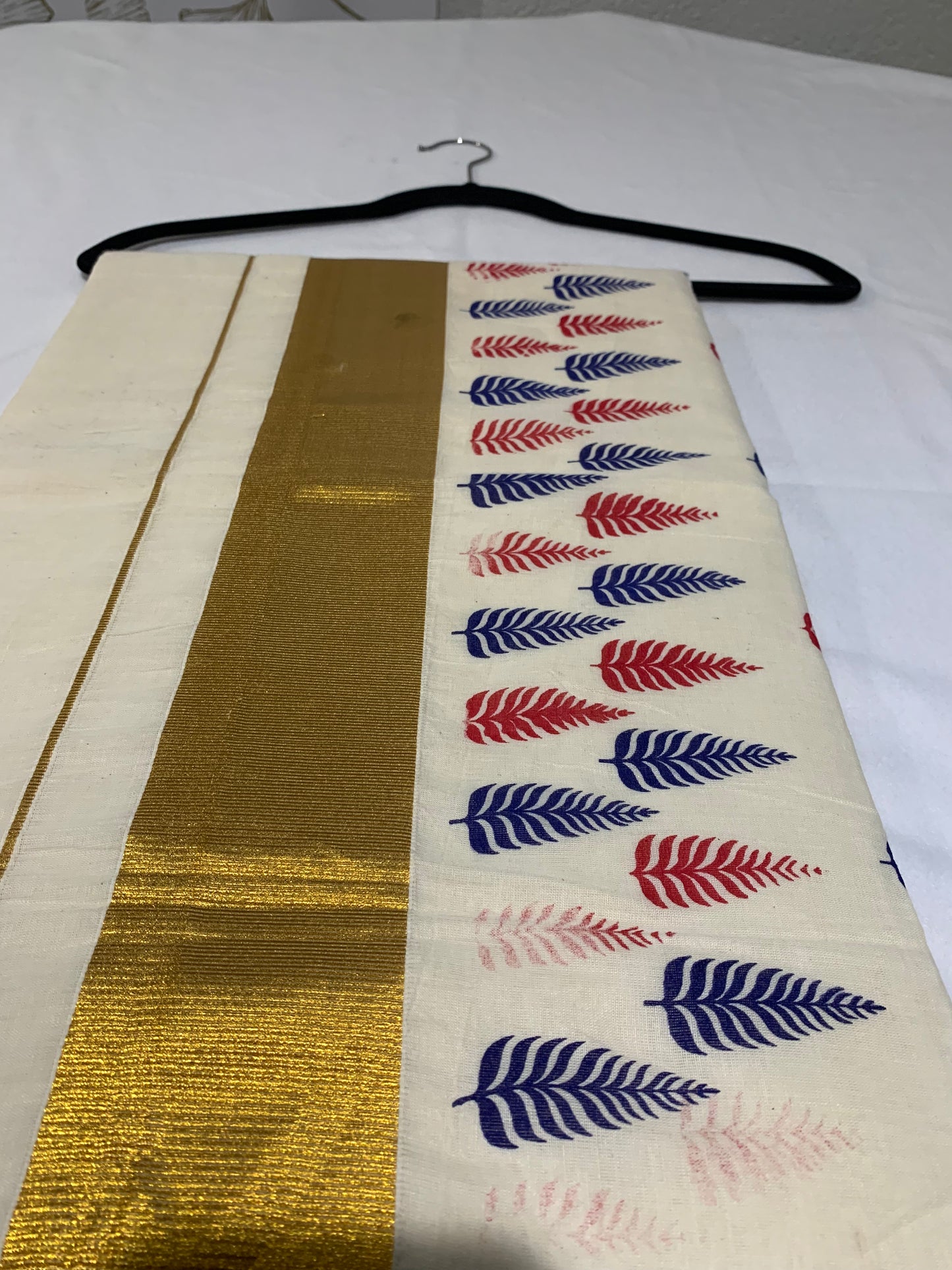Golden printed kasavu saree