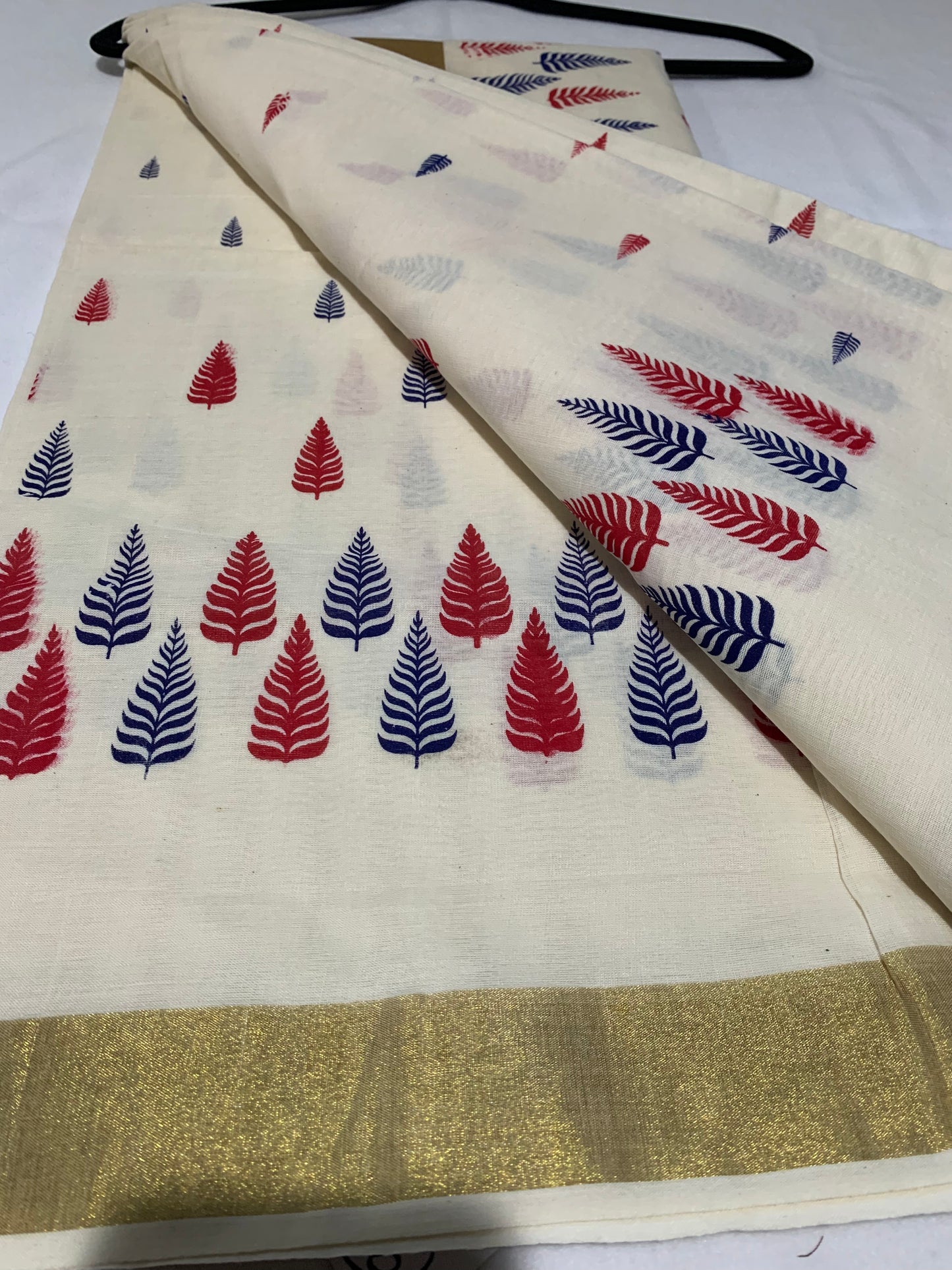 Golden printed kasavu saree