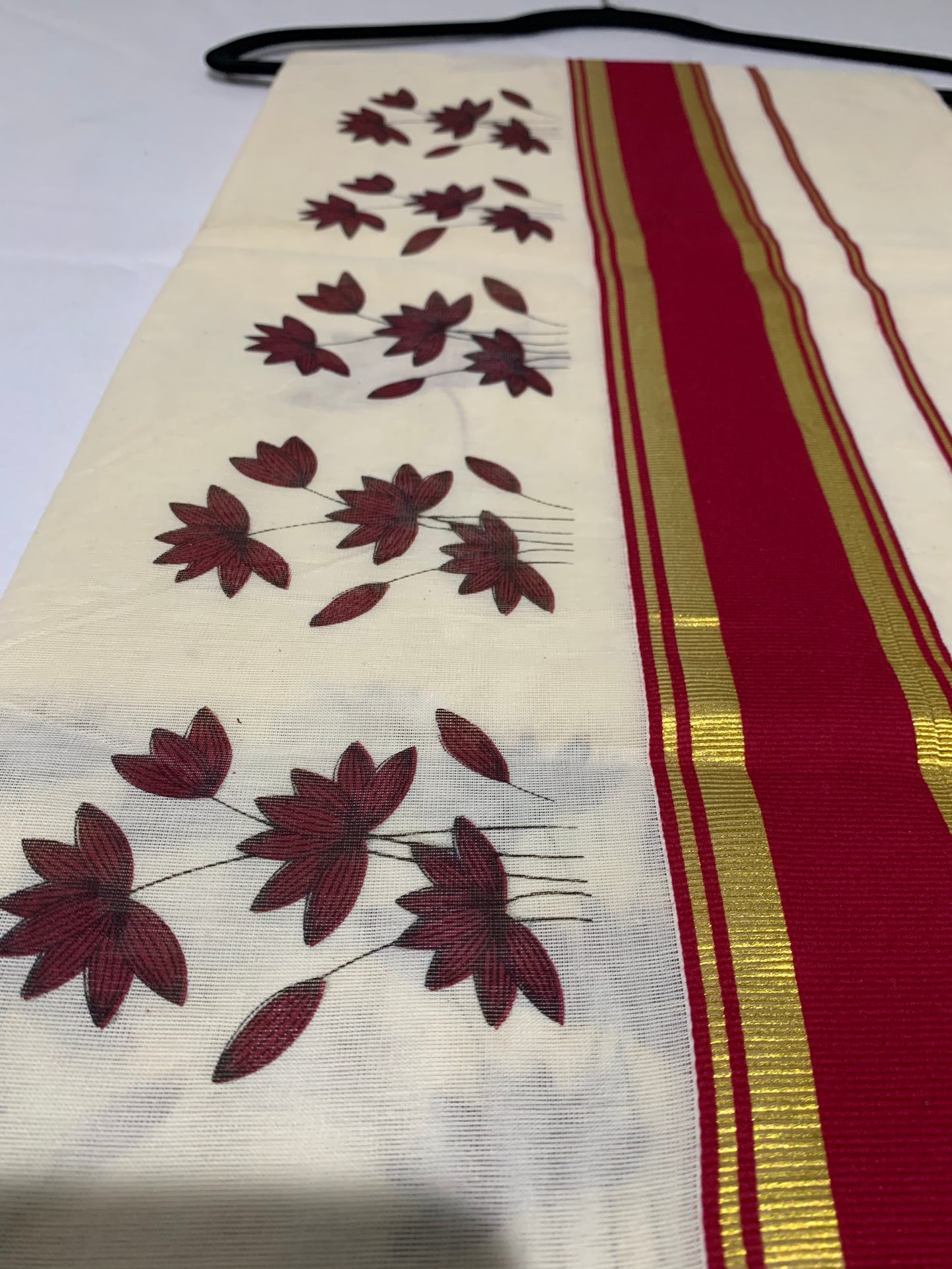 Gold and red border saree