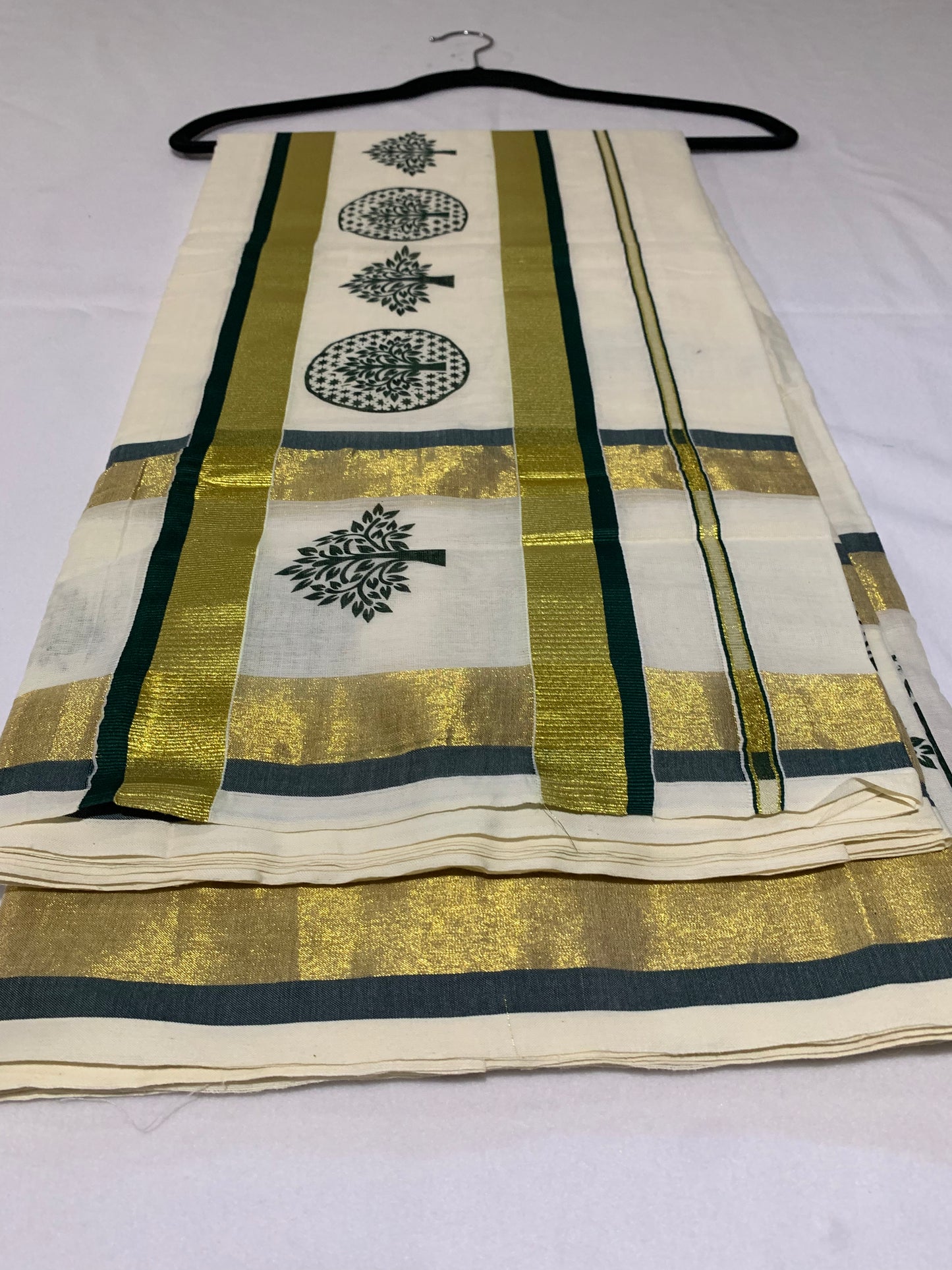 Gold and green double border saree
