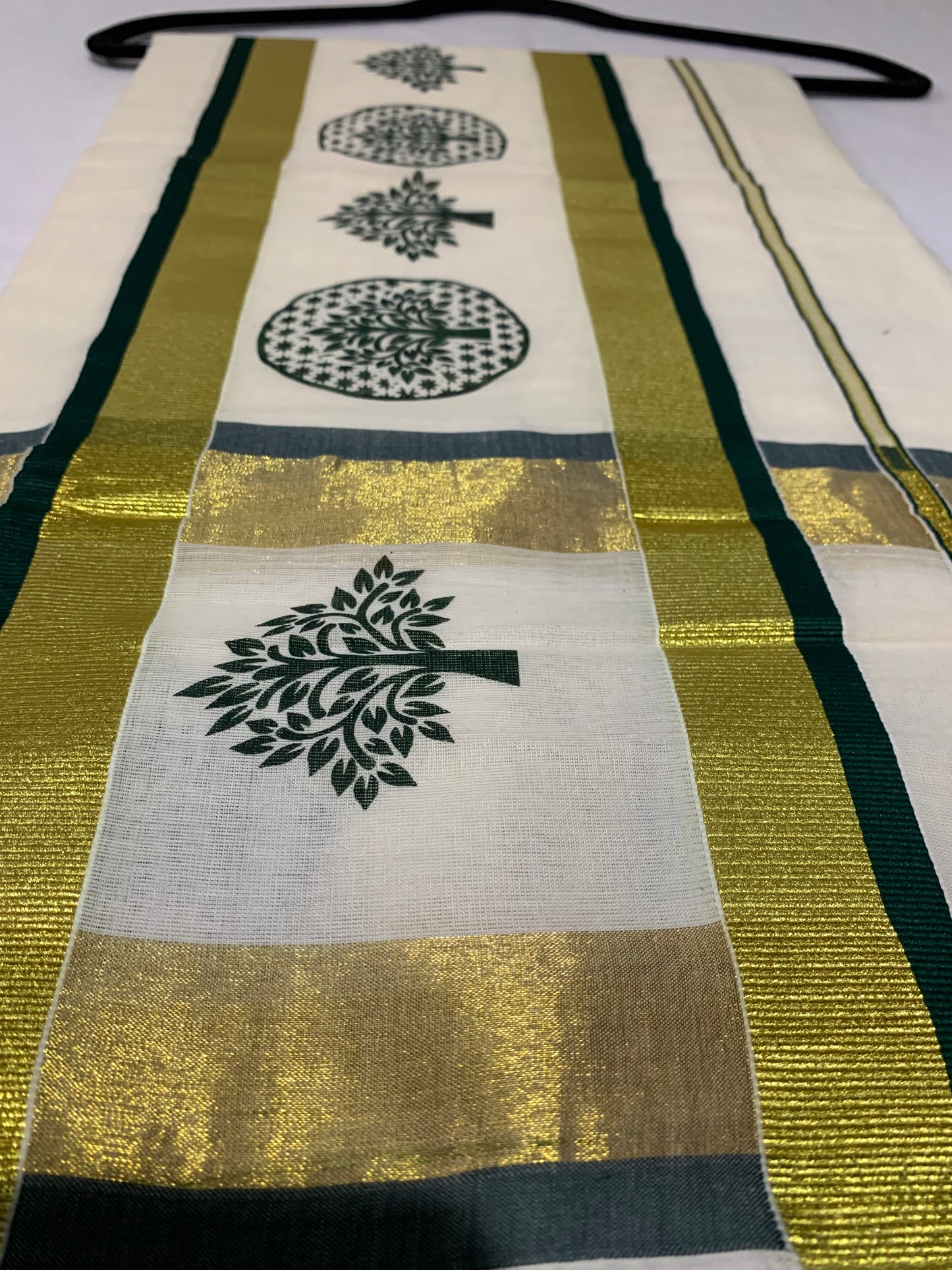 Gold and green double border saree