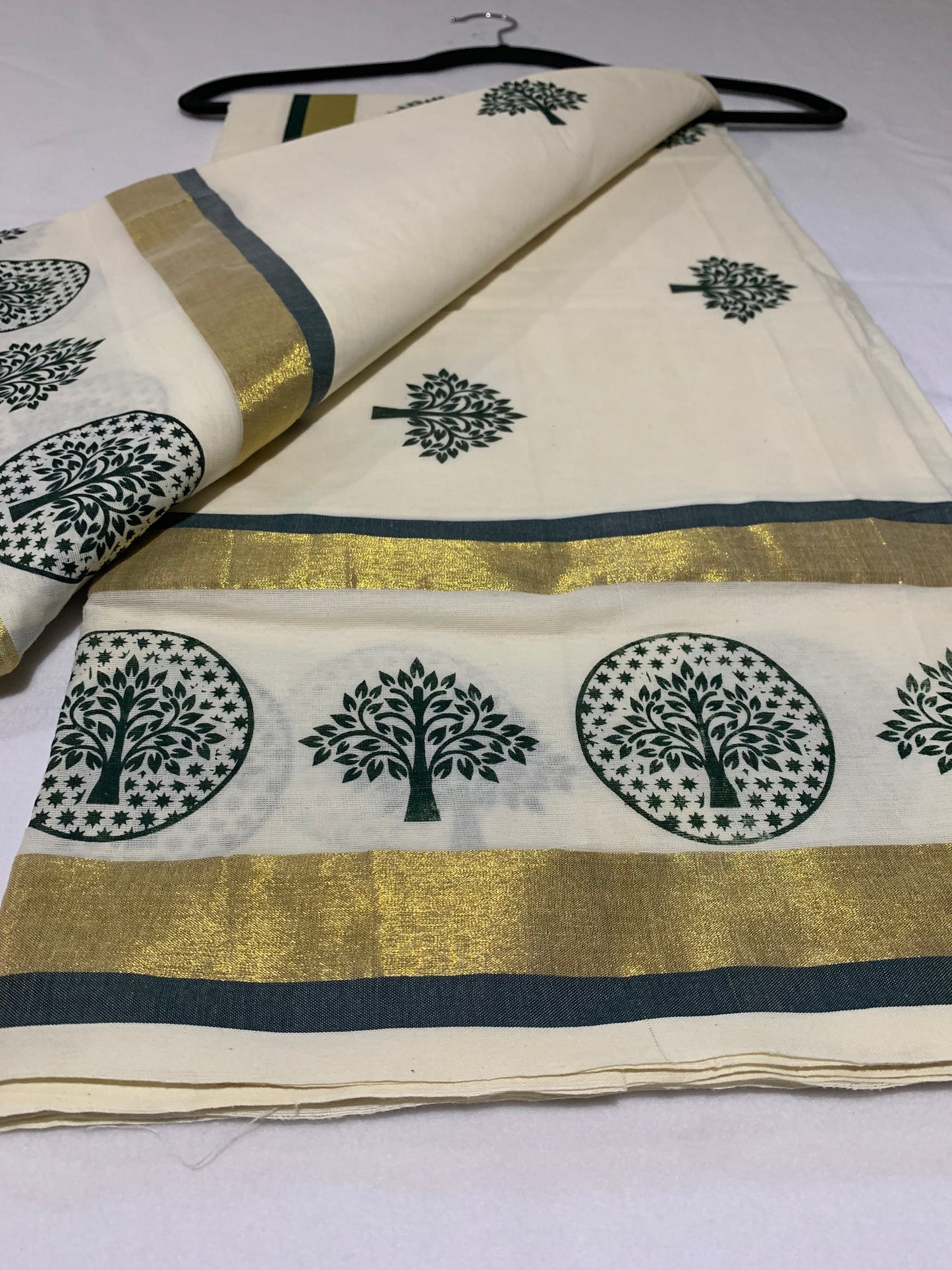 Gold and green double border saree
