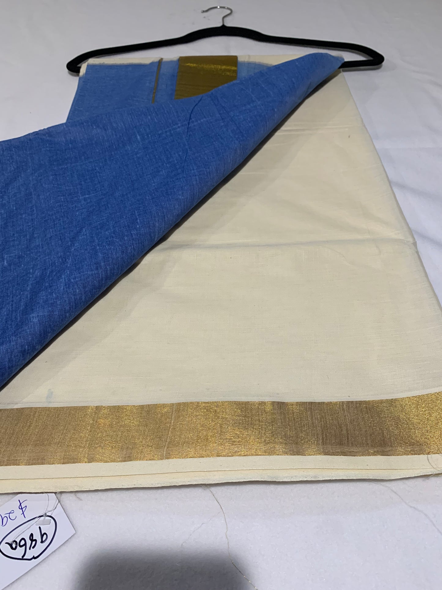 Golden kasavu saree with tie dye
