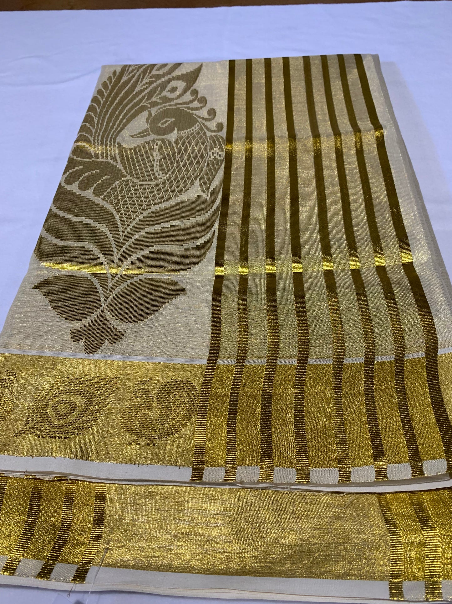 Golden kasavu saree