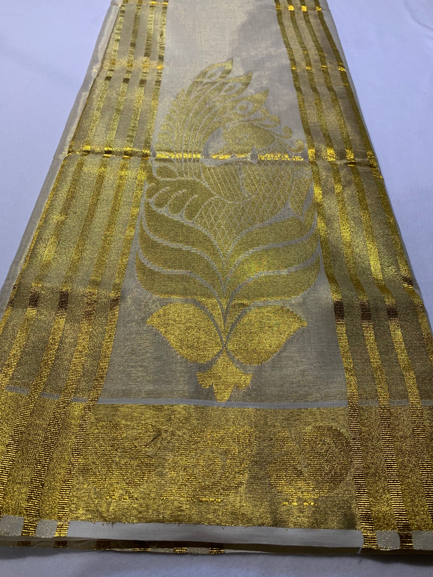 Golden kasavu saree
